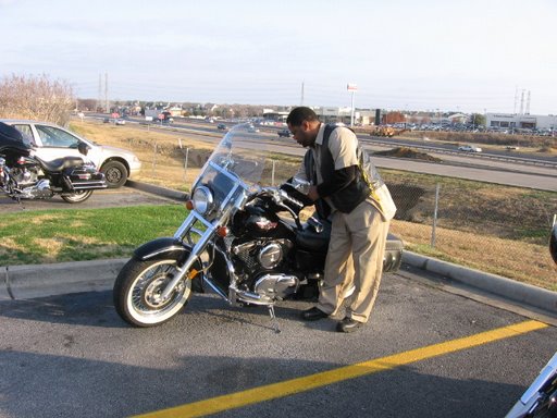 Hit Man messing around with his bike.